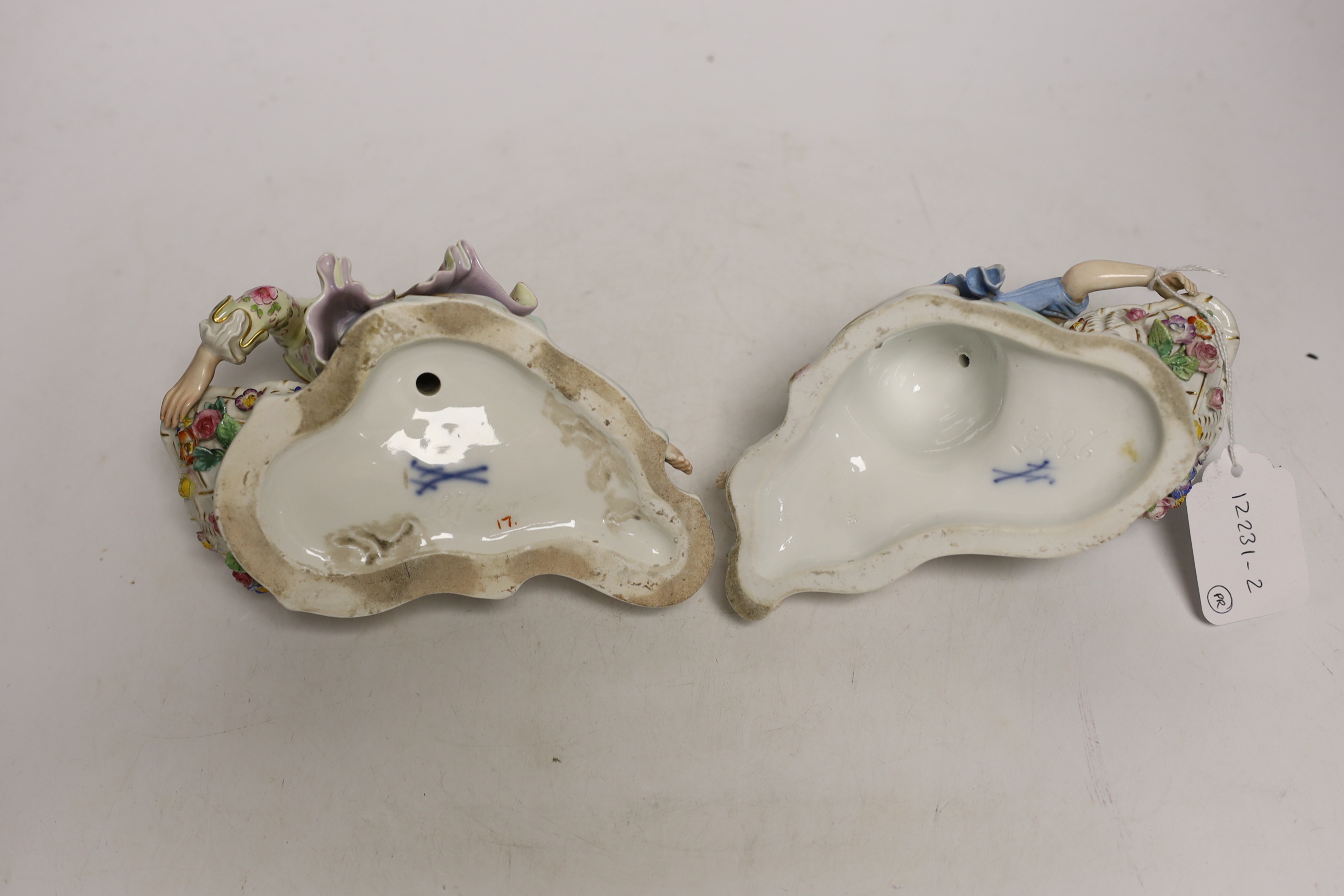 A pair of 19th century Meissen bon-bon figures, incised numbers 2875 and 2872